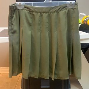 Green pleated skirt